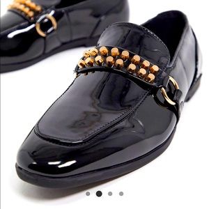 Black patent leather with gold studding!